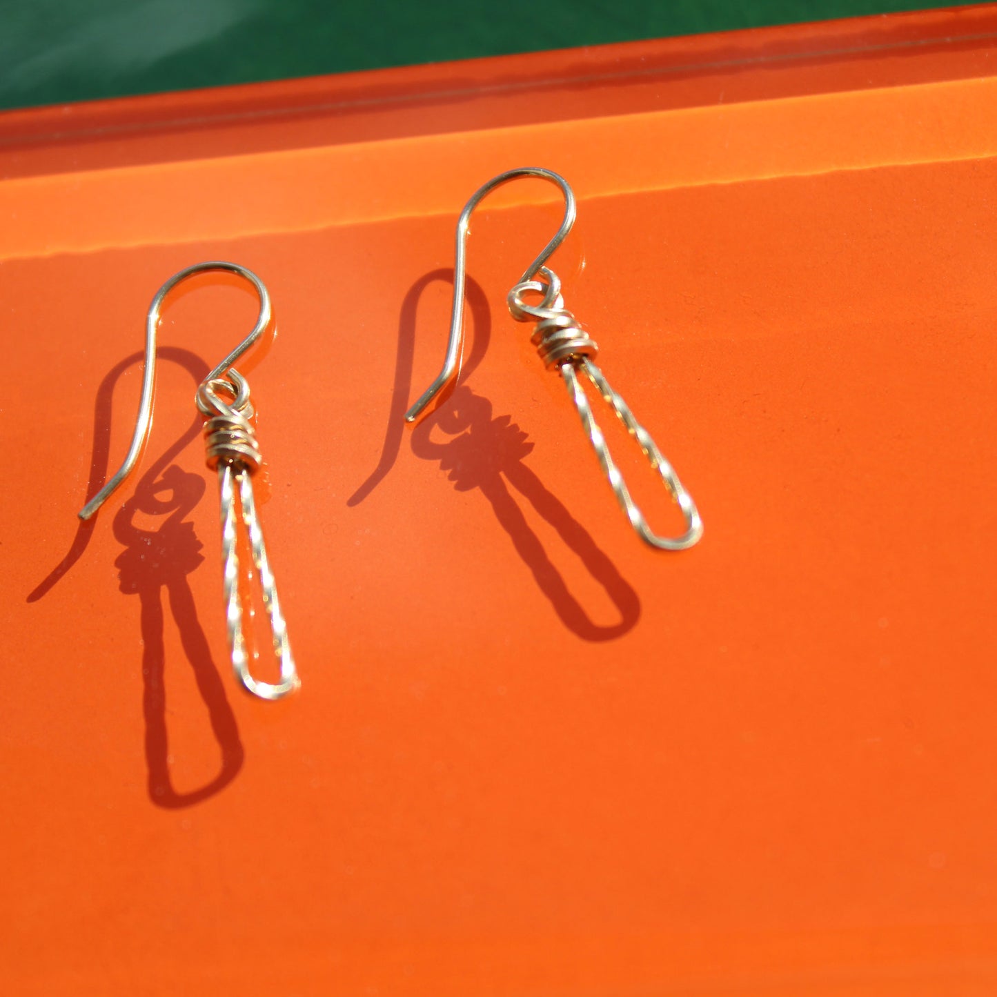twisted knot gold filled handmade earrings carrie foscato design