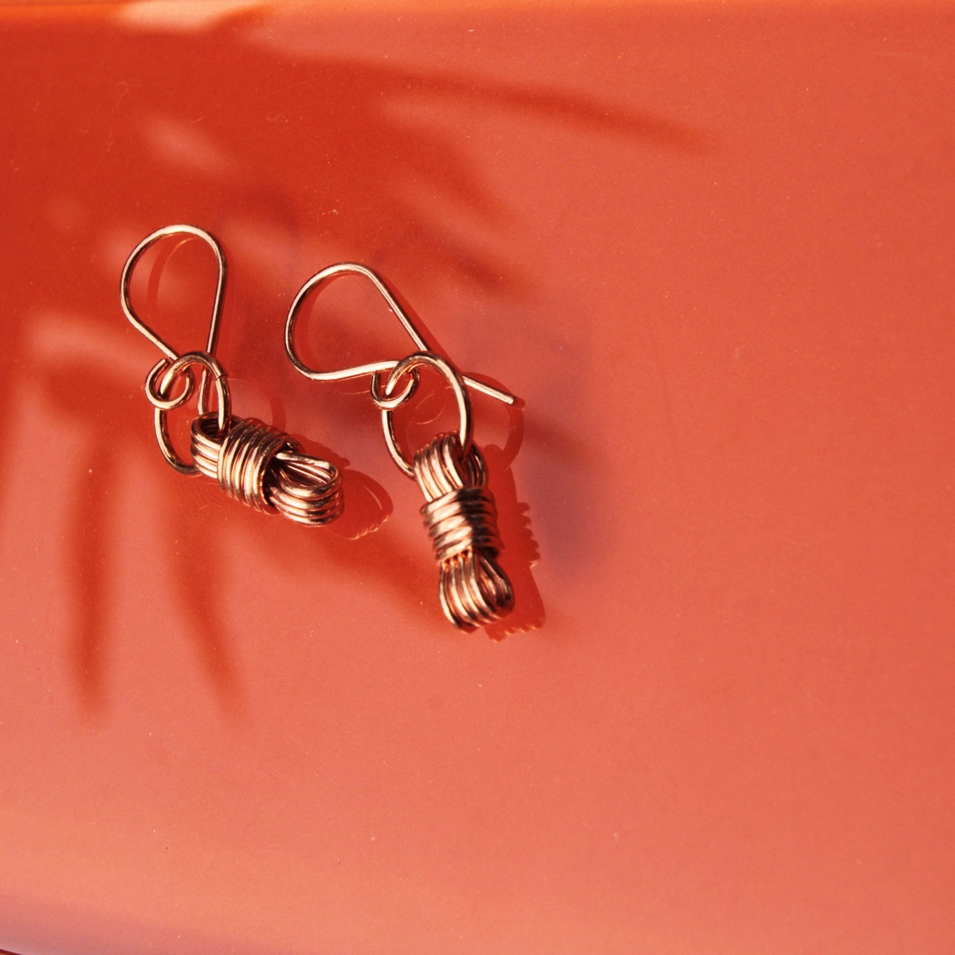 handmade nautical equestrian inspired wire wrapped copper earrings carrie foscato design USA