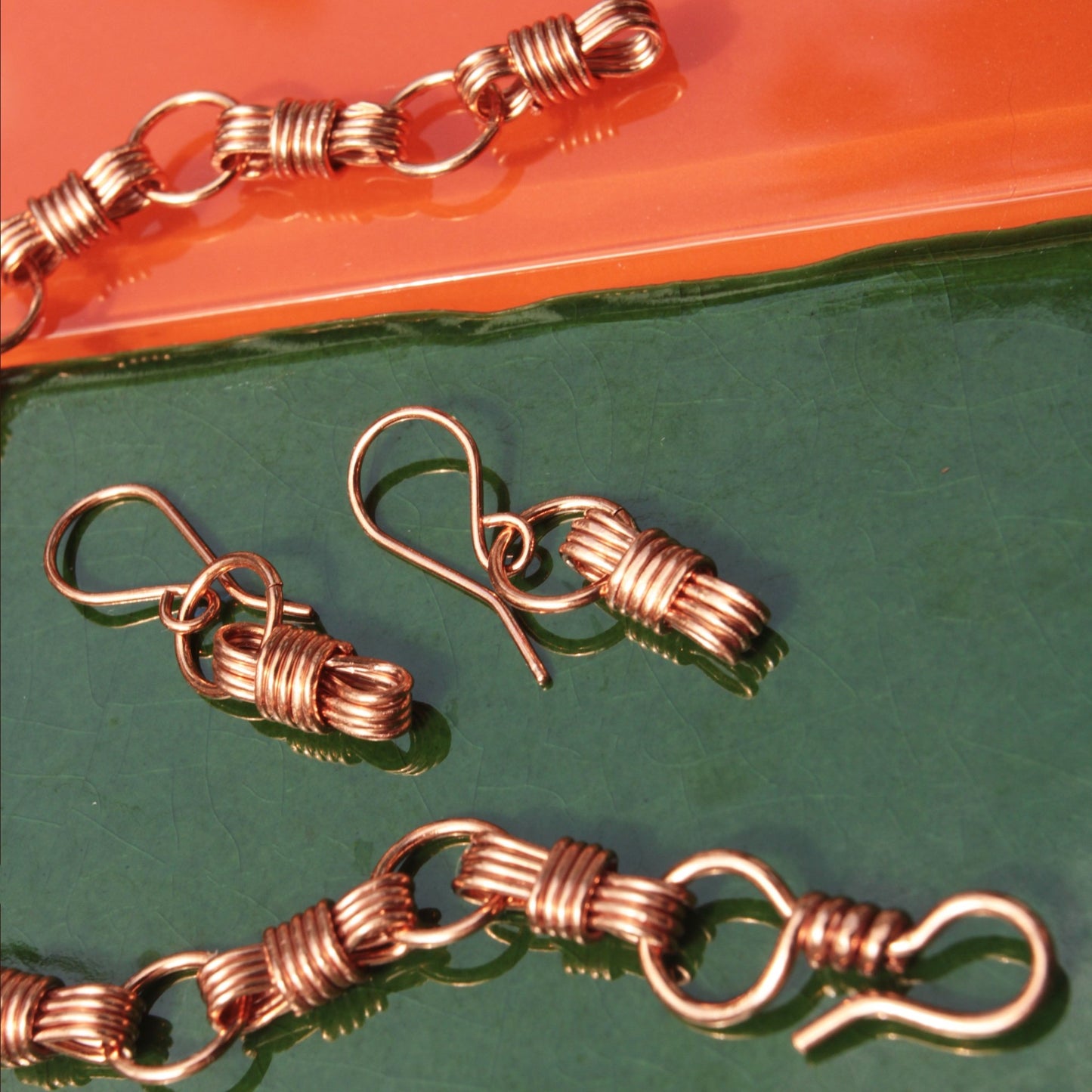 handmade nautical equestrian inspired wire wrapped copper earrings carrie foscato design USA