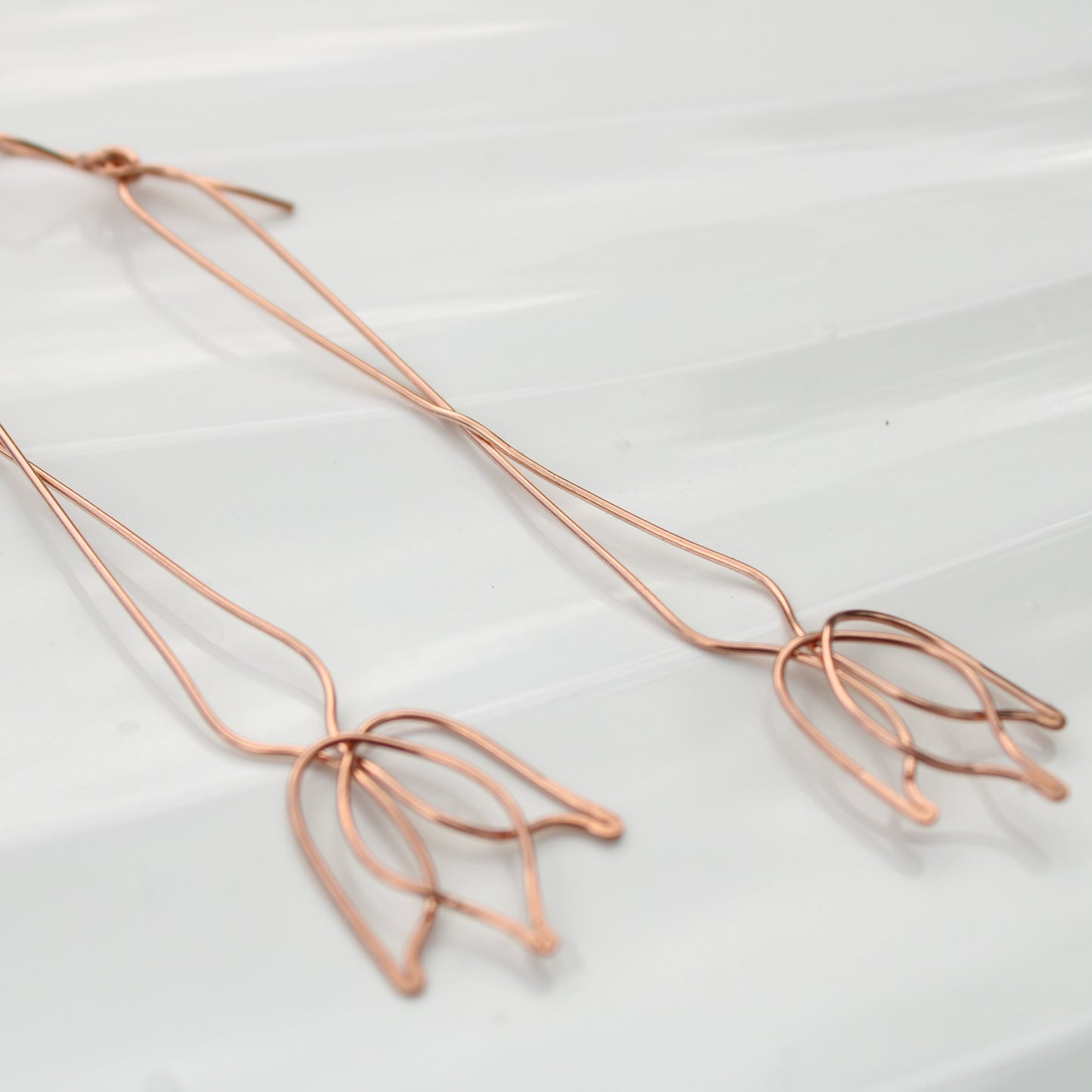 stunning 3.75" tulip inspired copper dangle earrings. handmade in USA carrie foscato design