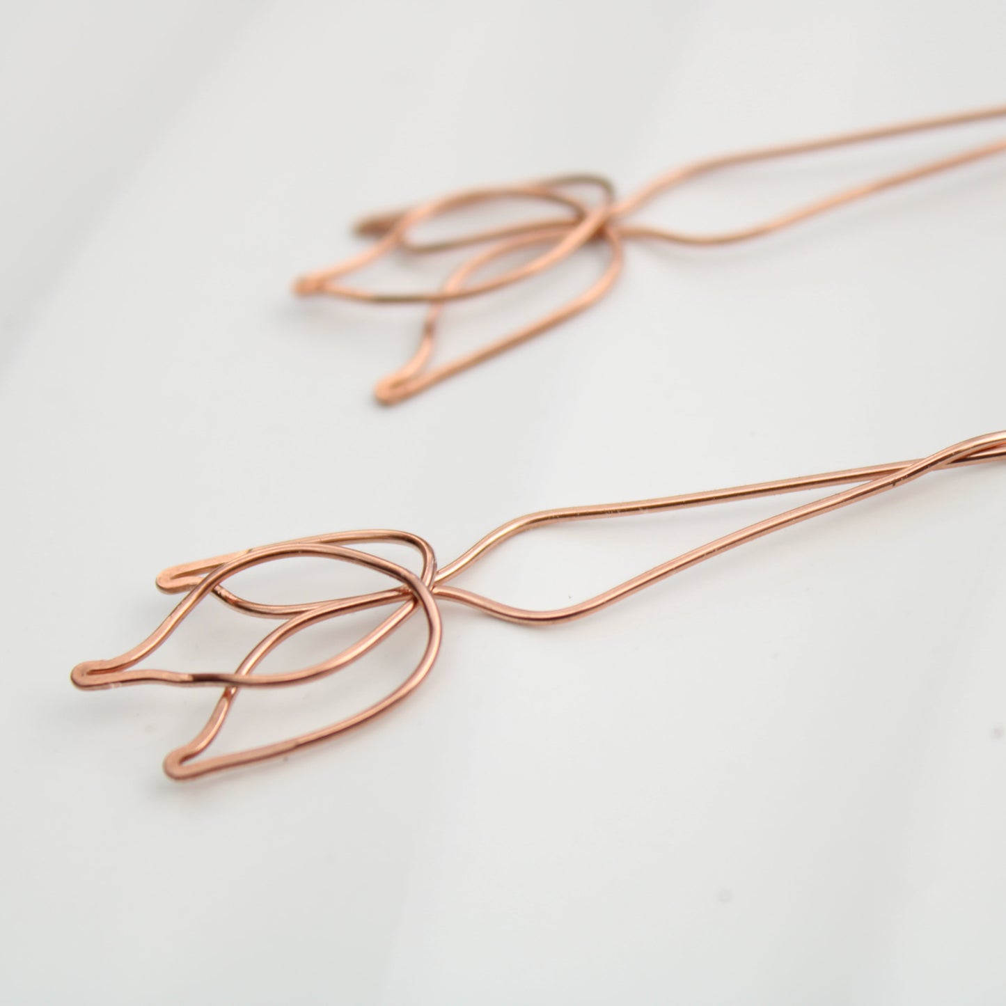stunning 3.75" tulip inspired copper dangle earrings. handmade in USA carrie foscato design