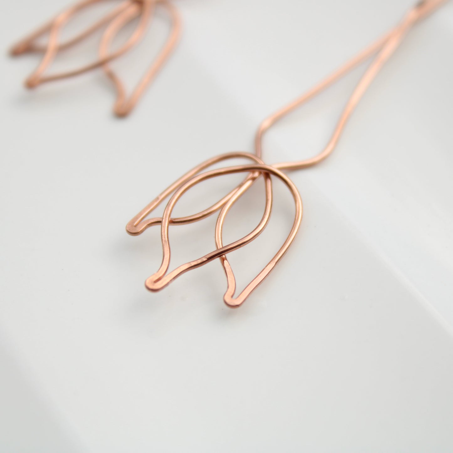 stunning 3.75" tulip inspired copper dangle earrings. handmade in USA carrie foscato design
