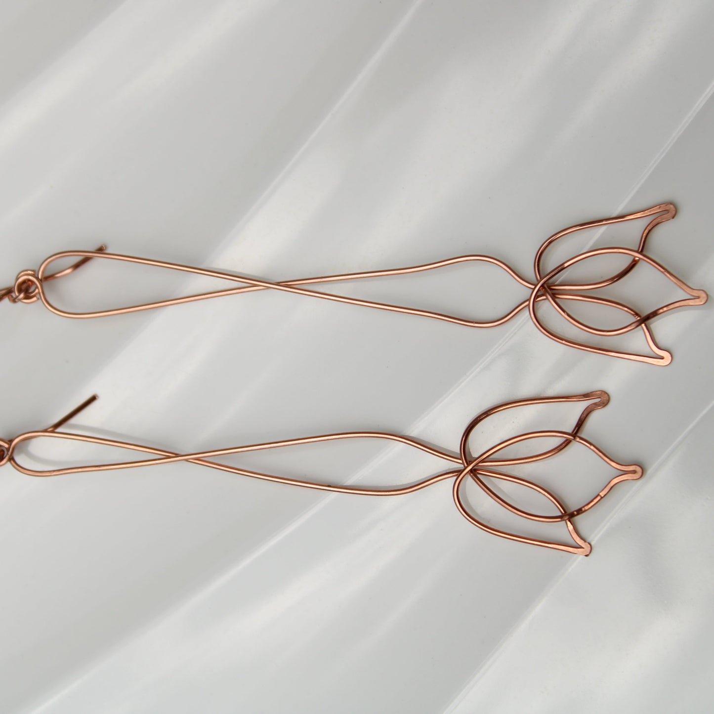 stunning 3.75" tulip inspired copper dangle earrings. handmade in USA carrie foscato design