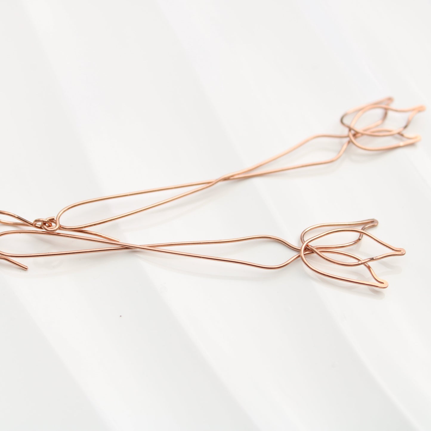 stunning 3.75" tulip inspired copper dangle earrings. handmade in USA carrie foscato design