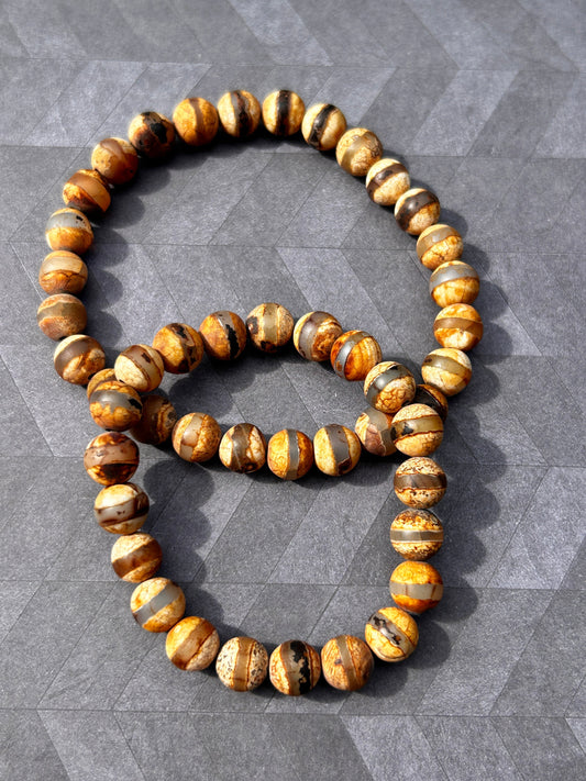 His & Hers Tibetan Agate stretch cord bracelets (Tan)