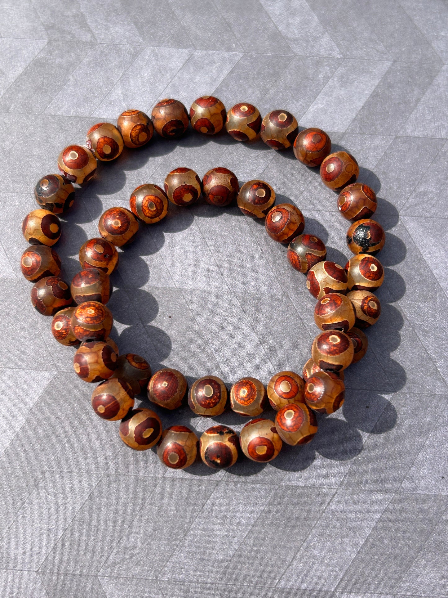 His & Hers Tibetan Agate stretch cord bracelets (red brown)