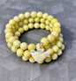 Lemon Lime Beaded Memory Wire Bracelet with Mother-of-Pearl Dove Dangle