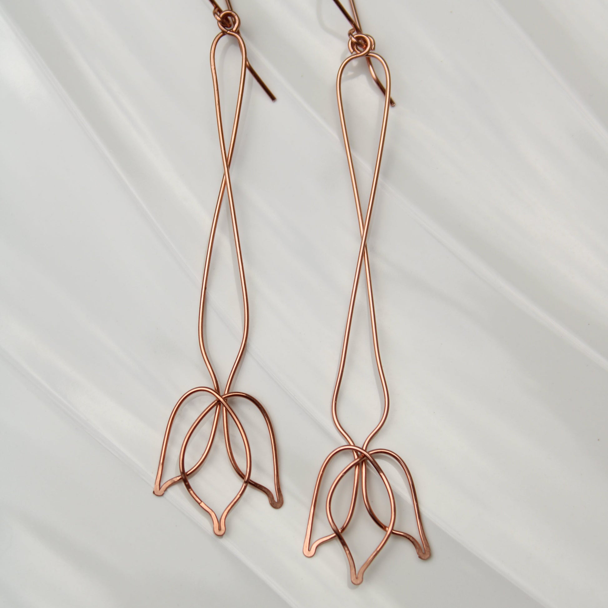 stunning 3.75" tulip inspired copper dangle earrings. handmade in USA carrie foscato design