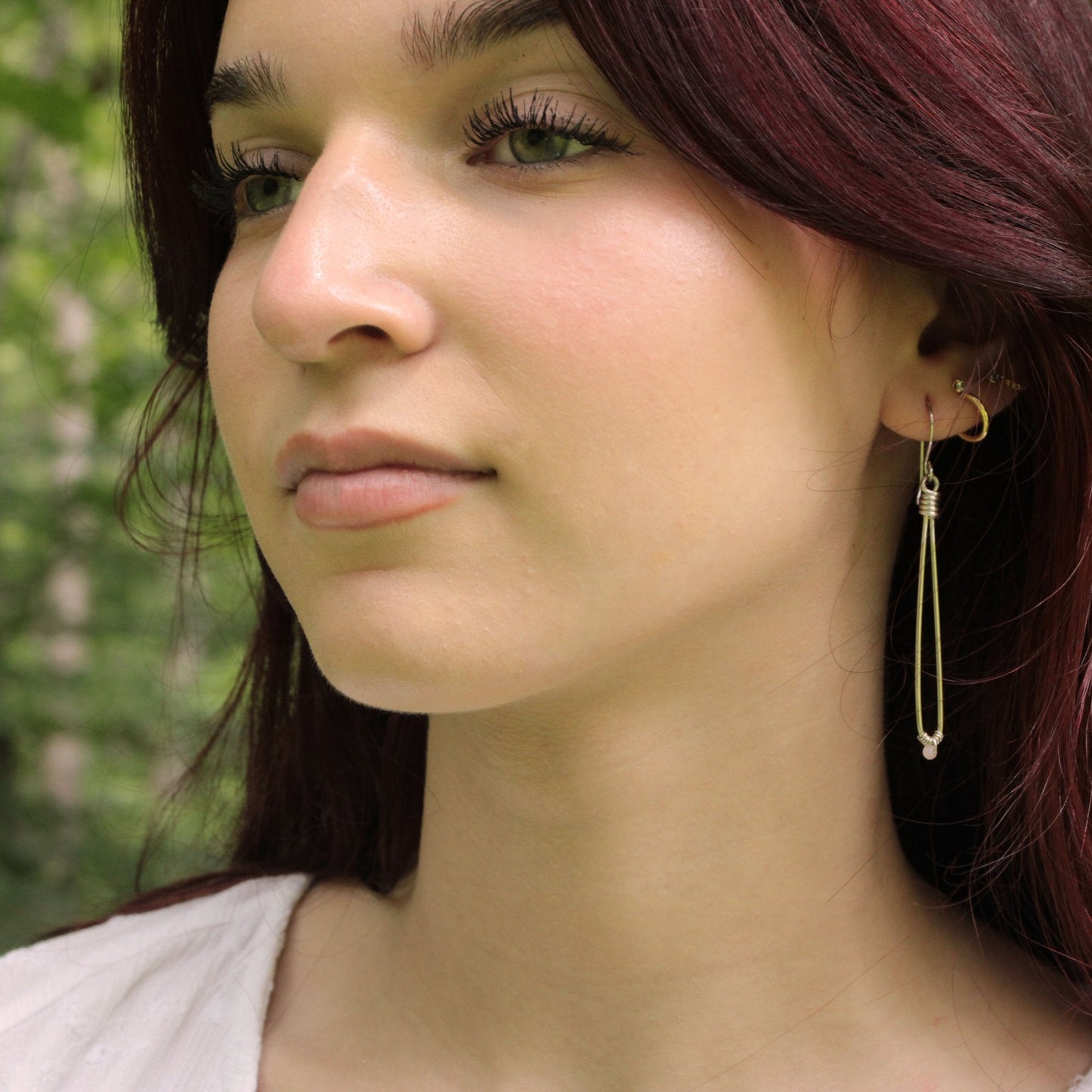 Sleek sterling silver long drop handmade earrings with rose quartz crystal beads carrie foscato design