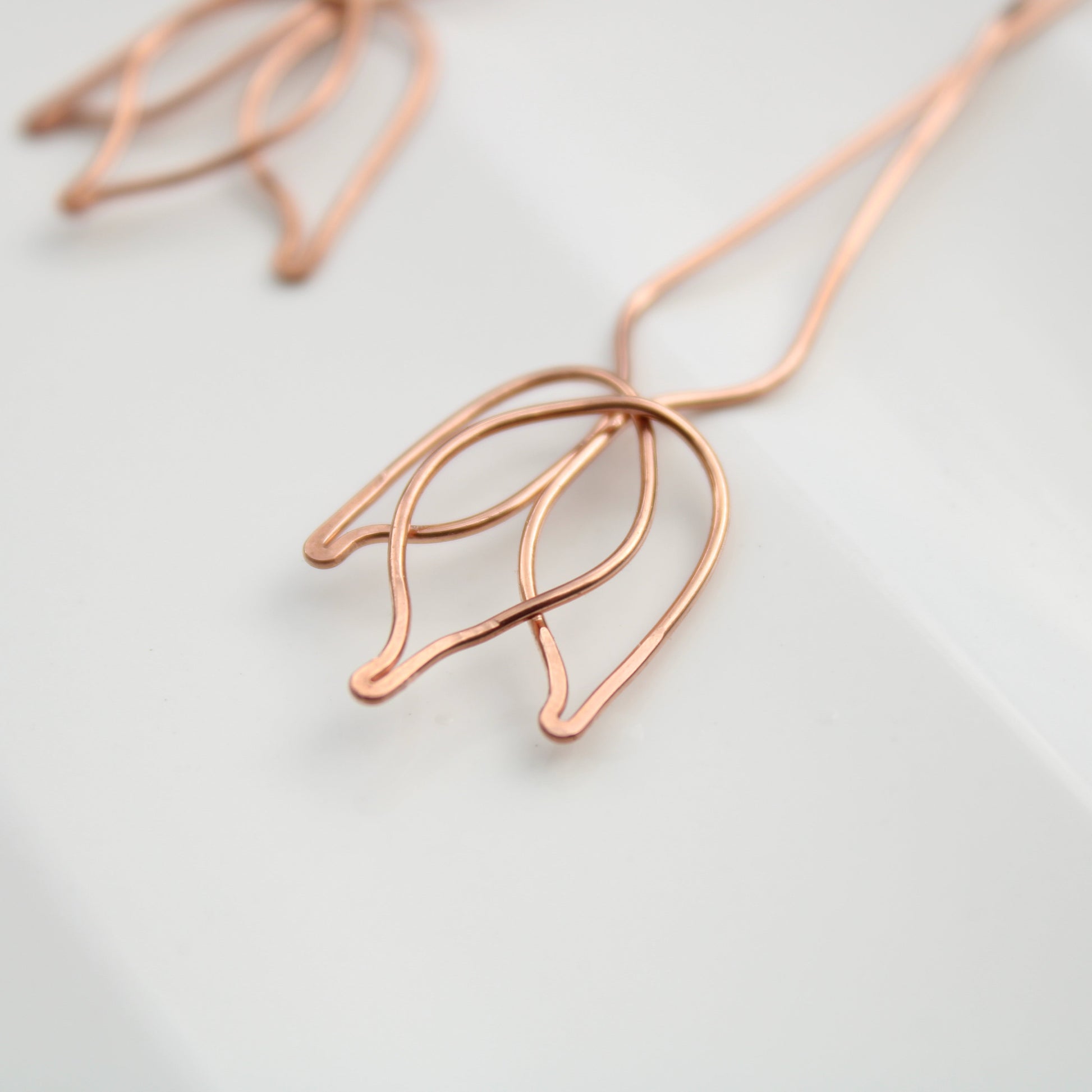 stunning 3.75" tulip inspired copper dangle earrings. handmade in USA carrie foscato design