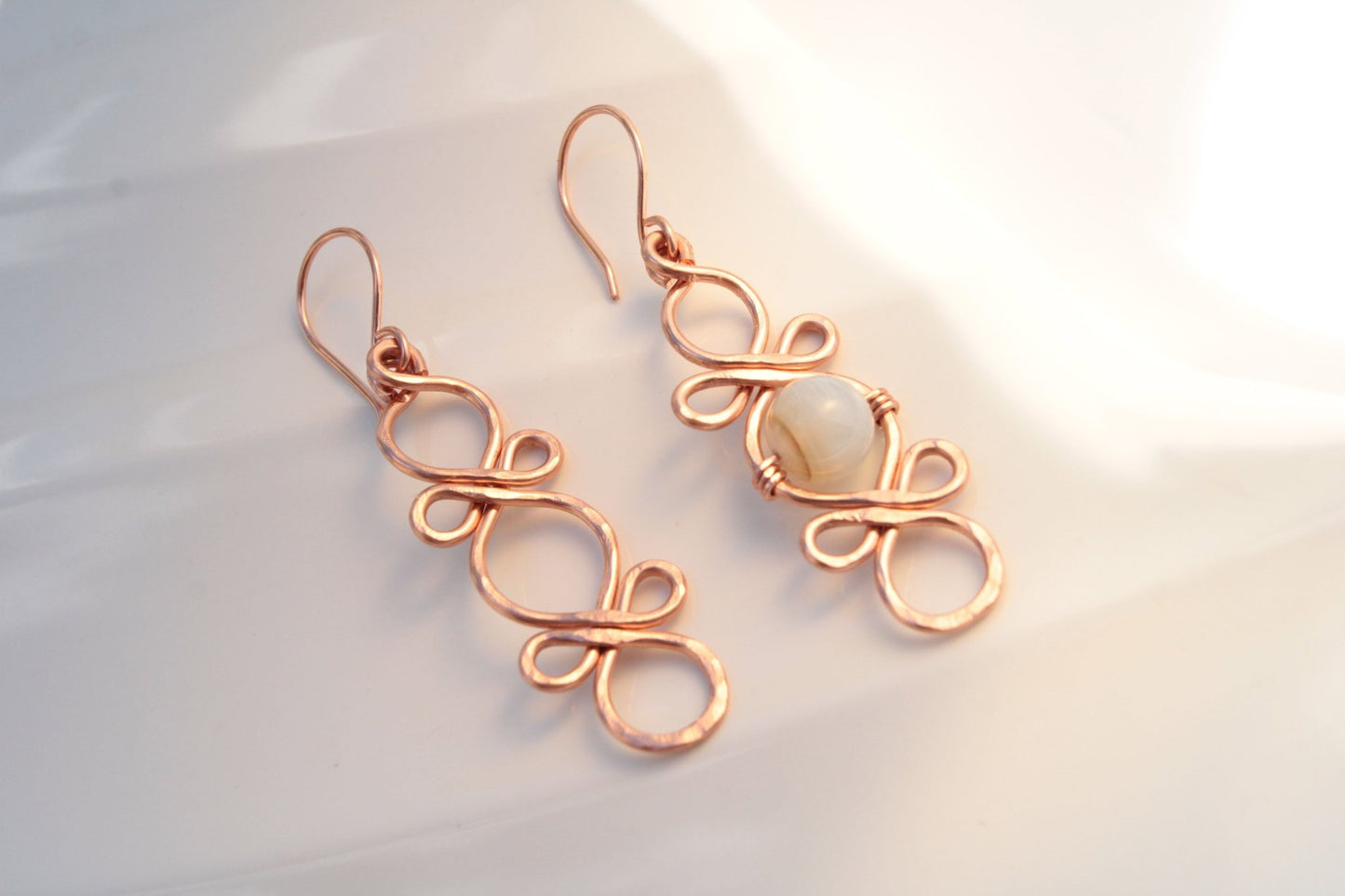 Triple Infinity Looped with custom accent bead handmade french ear wires carrie foscato design USA