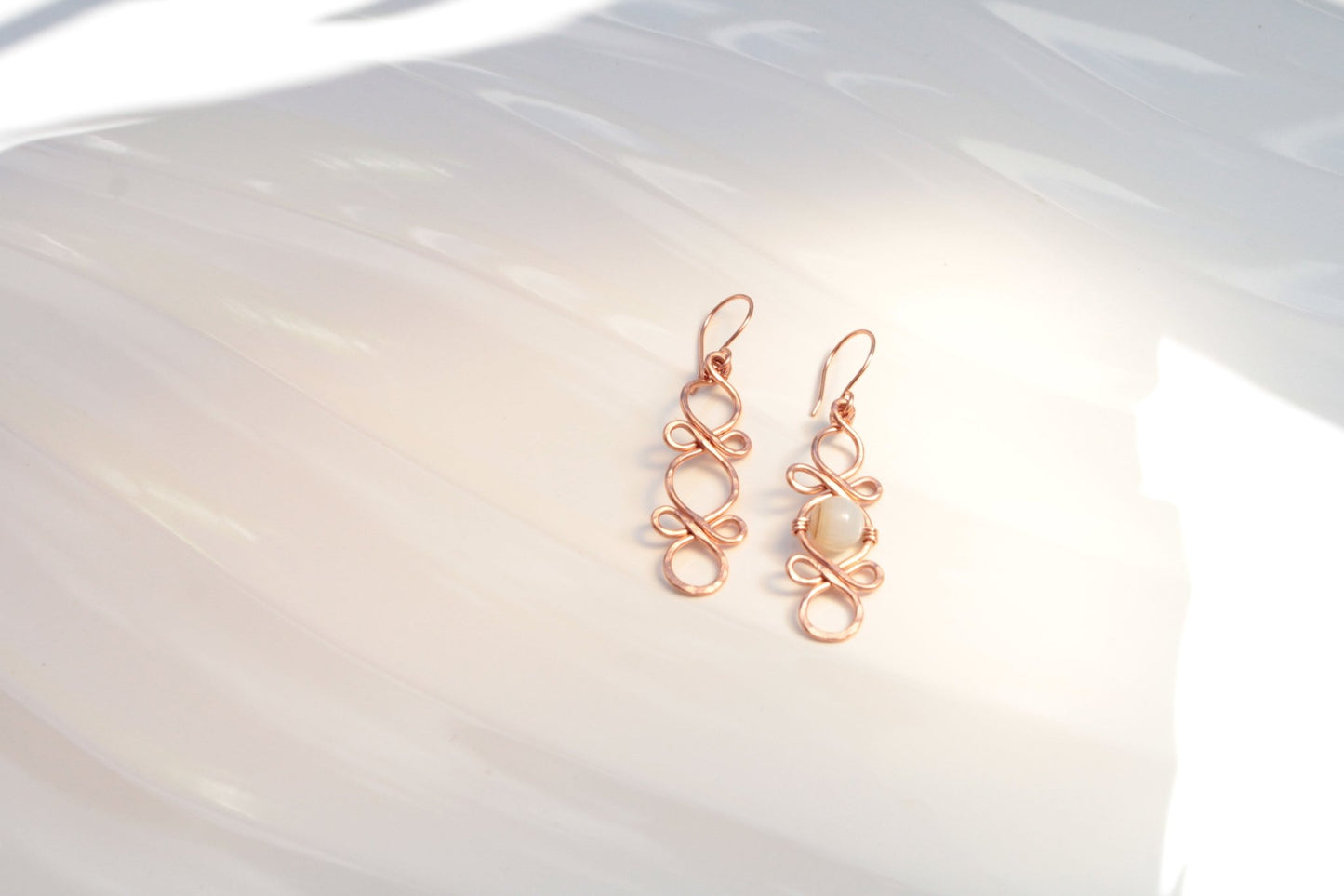 Triple Infinity Looped with custom accent bead handmade french ear wires carrie foscato design USA